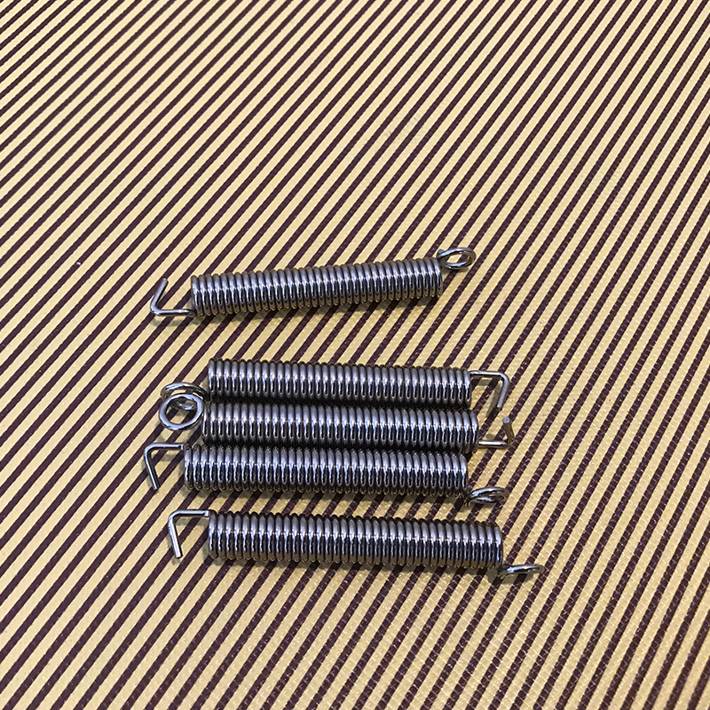Electric guitar body spring